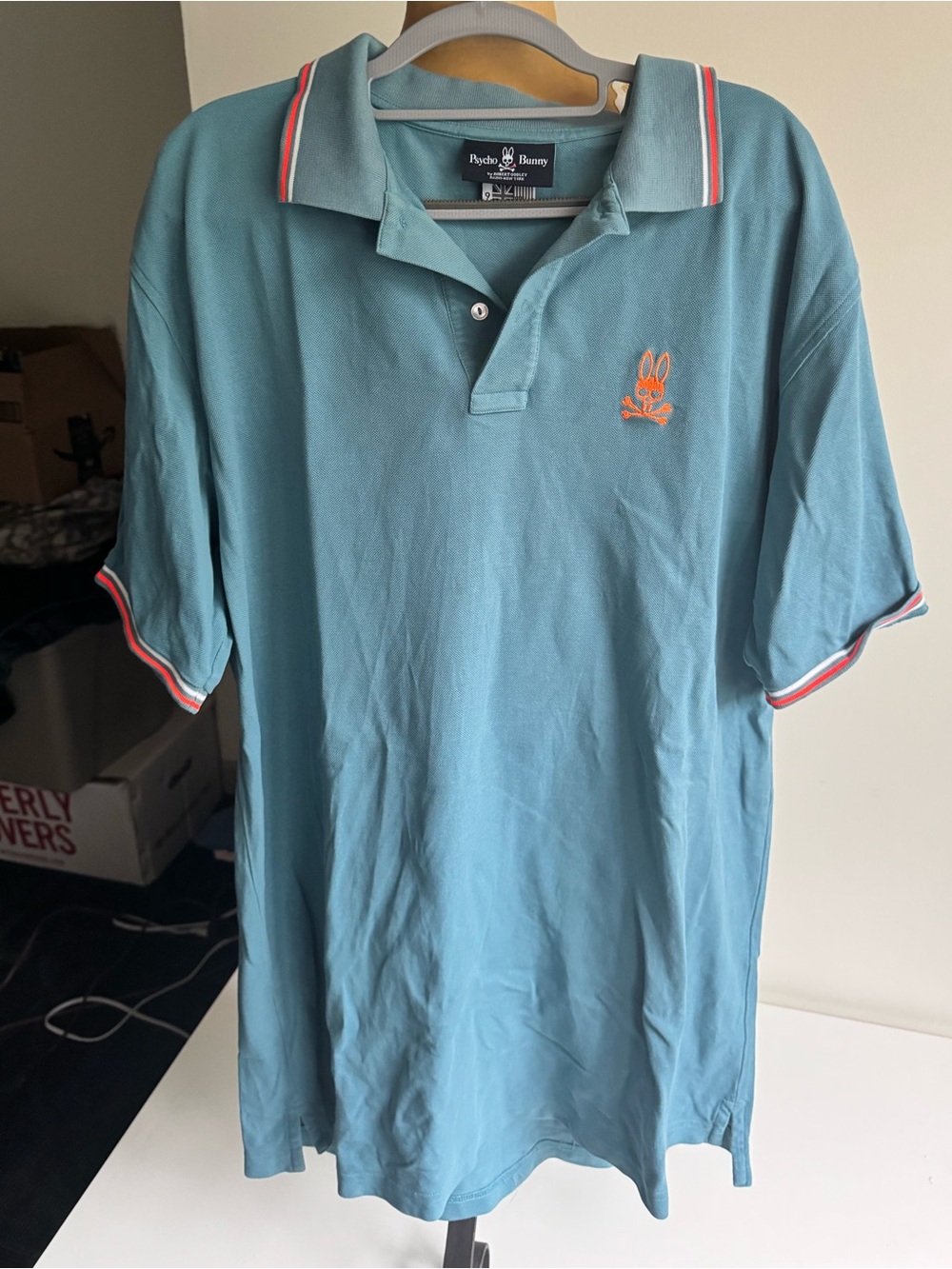 Psycho Bunny Teal Piqué Polo Shirt with Neon Orange Accents